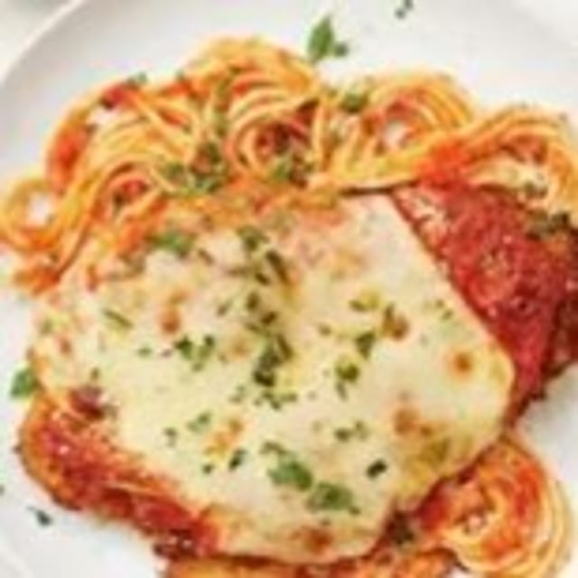 Chicken Parmesan Dinner with Pasta and Small Salad.