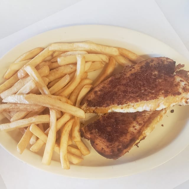 Four Cheese Grilled Cheese with Fries.